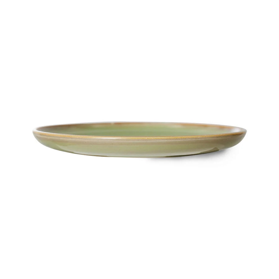 as each is hand painted, each plate is different which is even visible in this side on view of the green plate showing that even the underside is as cooourful as the top