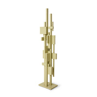 Angled view of the tall pistachio wooden Skyscraper sculpture on its square base