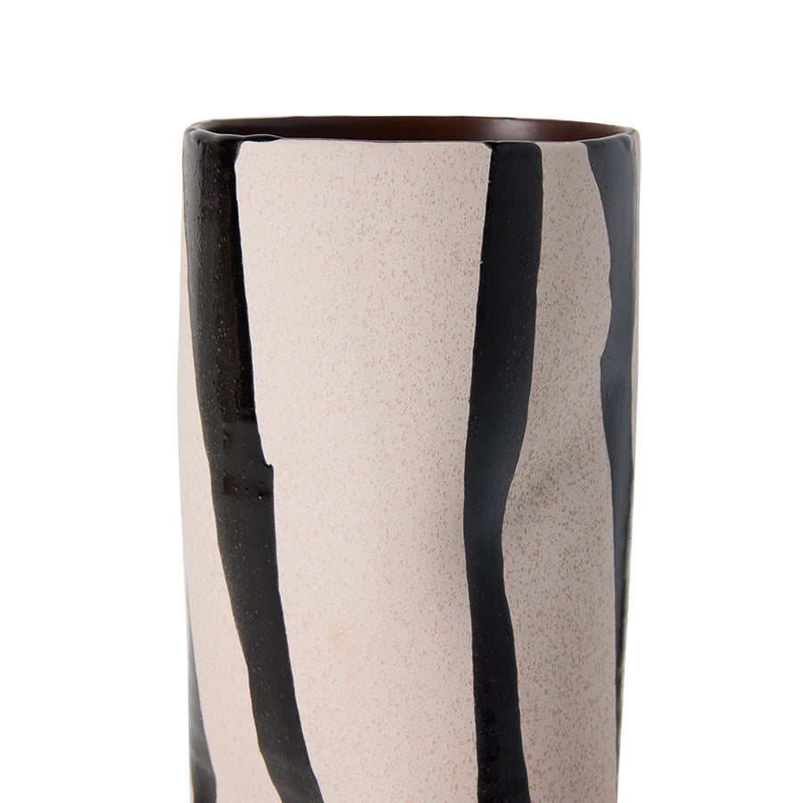 Close-up of the Mono Vase's rim and black stripe pattern on the warm sand-coloured earthenware surface