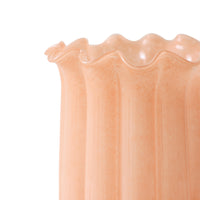 Close-up of the scalloped rim and ribbed texture of the peach glass vase by HKLIVING