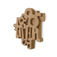 Angled view of the HKLIVING brutalist terracotta wall sculpture showing its depth and rough texture