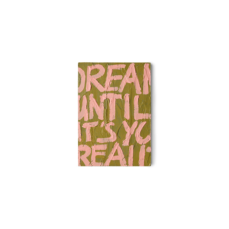 HKLIVING Pocket Exhibit 'Manifest', a hand-painted typographic MDF wall piece reading 'Dream until it's your reality' in pink on olive green, on a plain white background