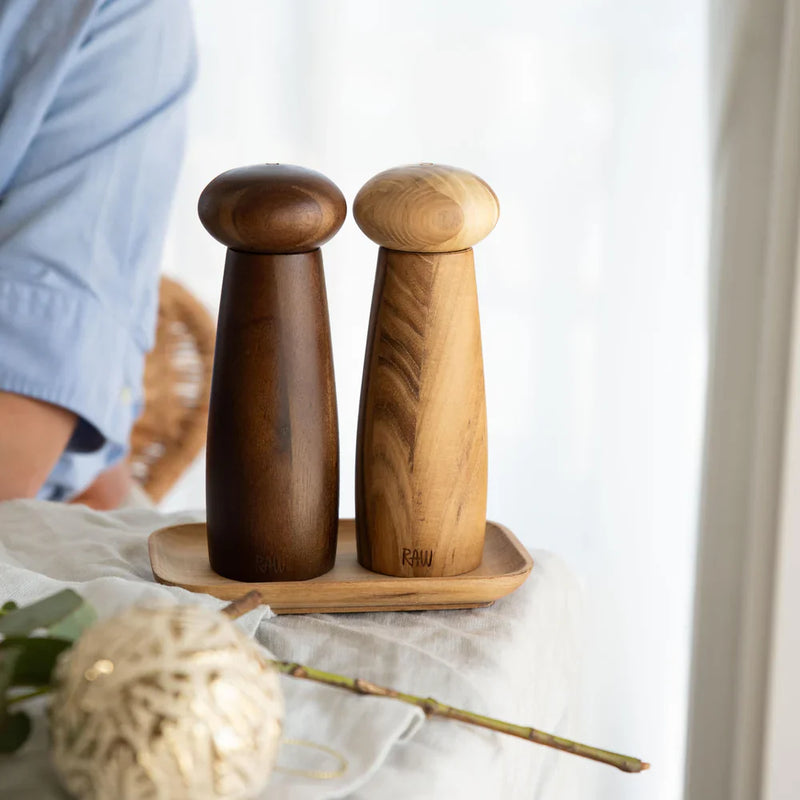 Mixed teak and dark wood grinders in Scandinavian style