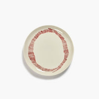 off white with red striped side plate or perhaps for starters or lunchtime sandwich from ottolenghi by serax with a high glaze level 