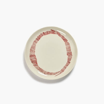 off white with red striped side plate or perhaps for starters or lunchtime sandwich from ottolenghi by serax with a high glaze level 