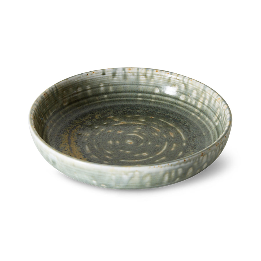 Medium rustic green deep plate by HKLIVING at an angle, showing the ringed centre