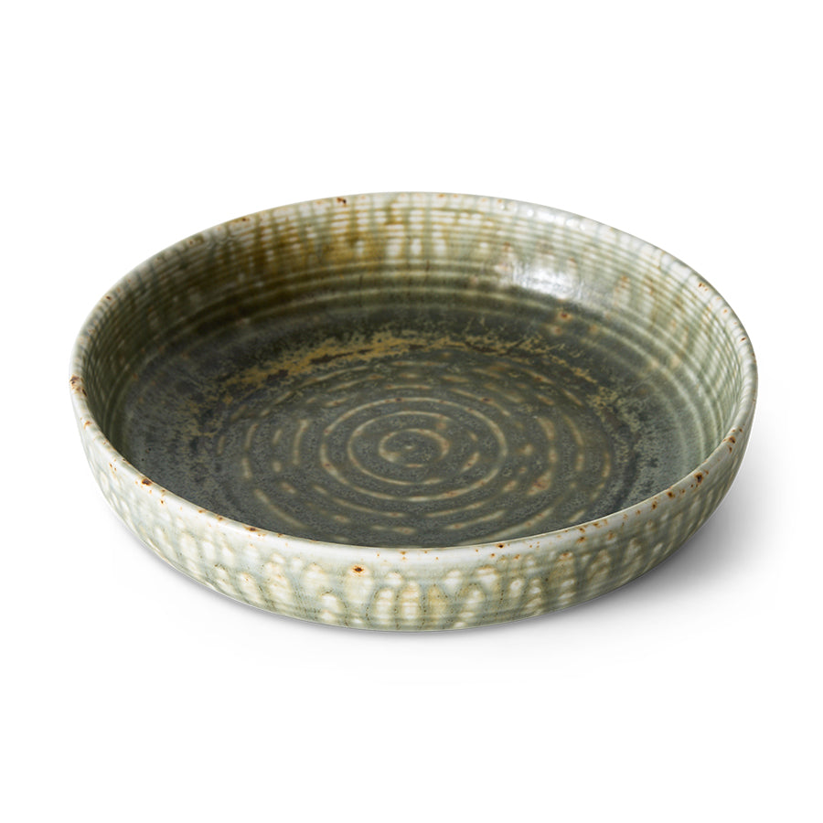 Large rustic green deep plate by HKLIVING at an angle, showing the ringed centre