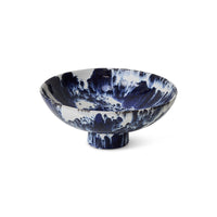 Side angle of the HKLIVING Splatter-Glaze Ceramic Bowl in Indigo showing the footed base
