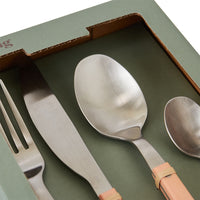 Close-up of the HKLIVING peach cutlery spoons and fork inside the green gift box