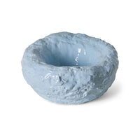 Close-up of the Cloud Bowl's textured, hand-shaped rim and pale sky-blue glaze