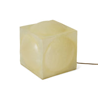 Glassfibre floor lamp styled beside a sofa