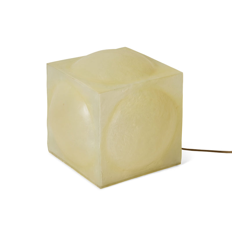 Glassfibre floor lamp styled beside a sofa