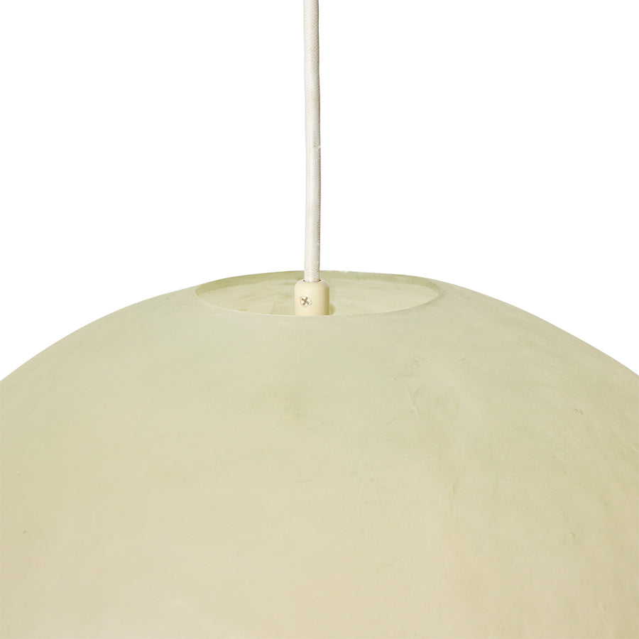 Glassfibre pendant lamp styled above a dining table