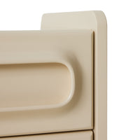 Angled close-up of the cream Space Nightstand by HKLIVING, showing the rounded drawer handles and top corner