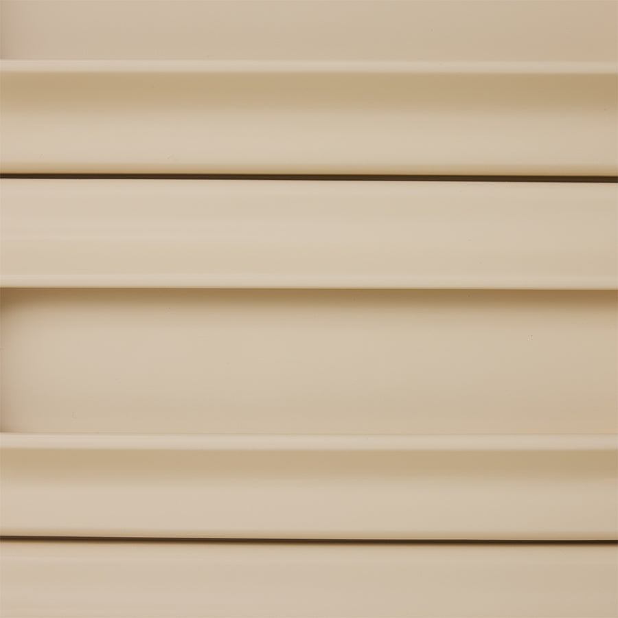 Close-up of the top drawer fronts and rounded handles on the cream Space Drawer Cabinet by HKLIVING