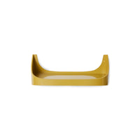 Angled view of the curved mustard-yellow Retro Wall Shelf by HKLIVING, showing the wall-fixing holes and rounded profile