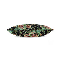 Woven Evening Bloom cushion styled on a sofa