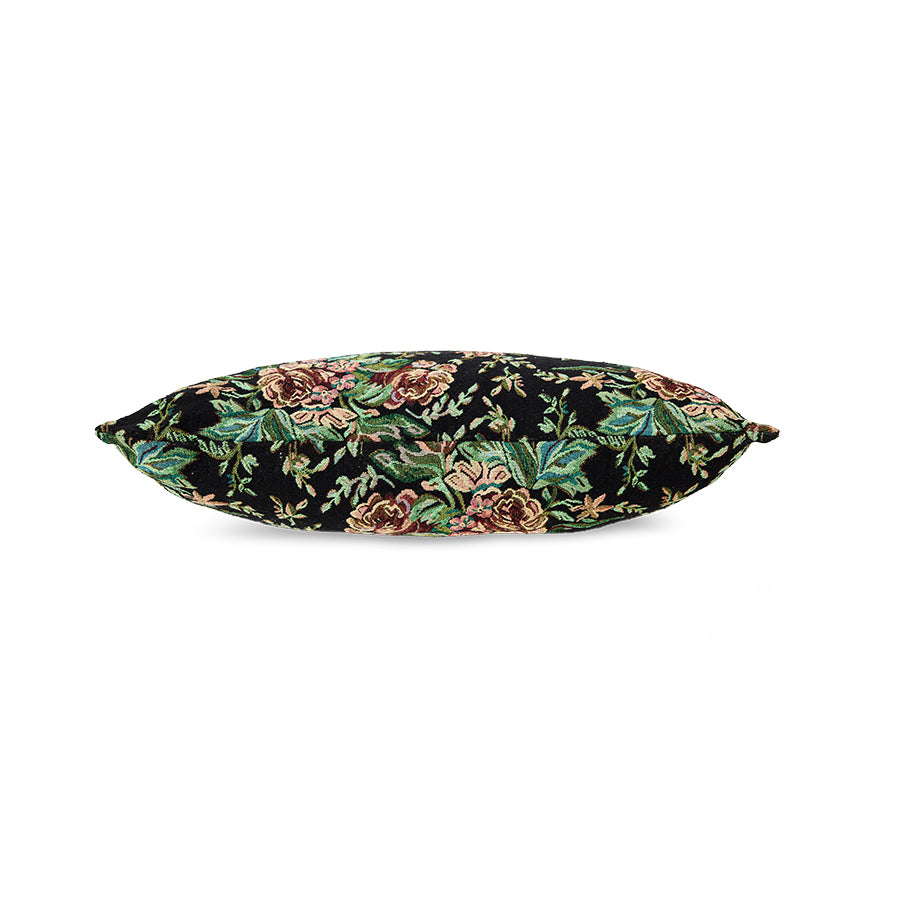 Woven Evening Bloom cushion styled on a sofa