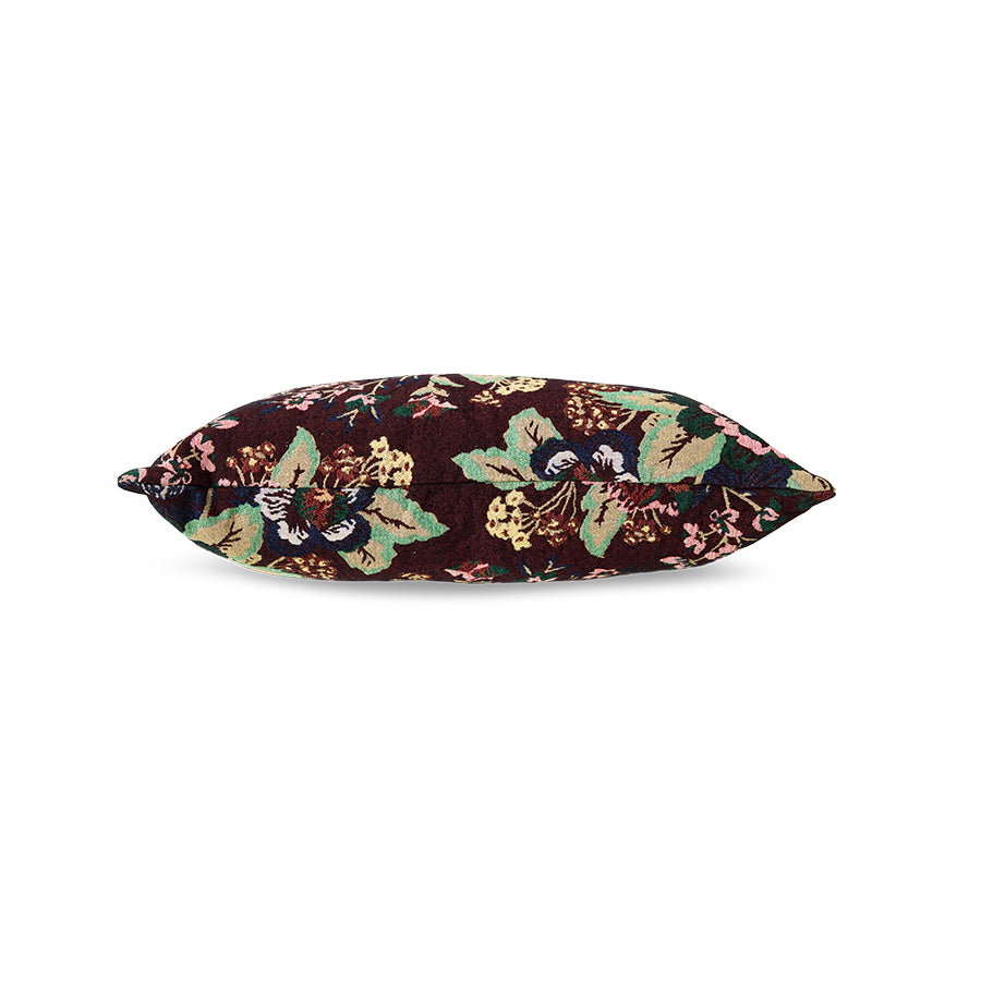 Woven Night Flower cushion styled on a sofa