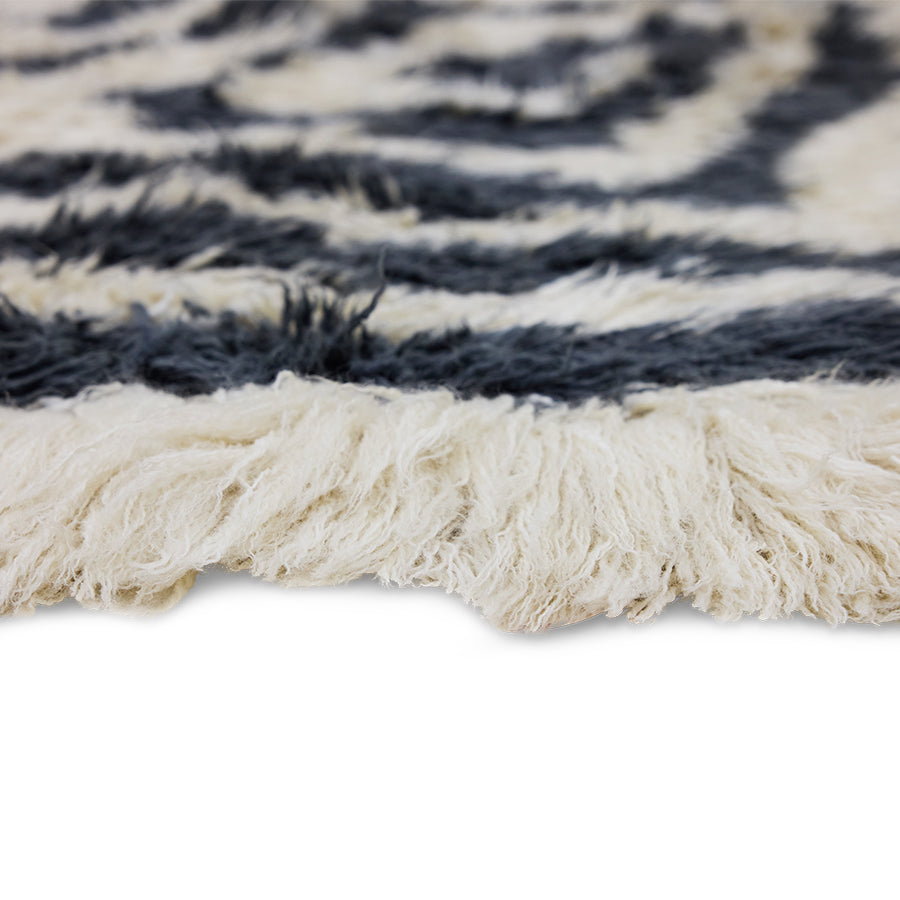 Organic Wool Rug in Black & Cream by HKLIVING – close-up of graphic spiral pattern