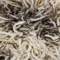 Close-up of the long ivory and brown shaggy fibres on the HKLIVING Wire Chair Comfort Kit cushion