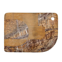 Front view of the Abrianna brown marble cutting board showing its natural grain-like stone pattern.