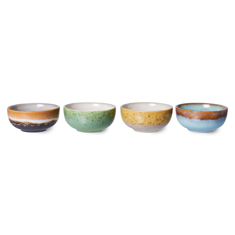 set of four hkliving XS bowls in a row showing navy, green, mustard and blue speckled glaze finishes