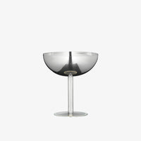 single stainless steel ice cup by aida with vanilla coloured ring detail at the base

