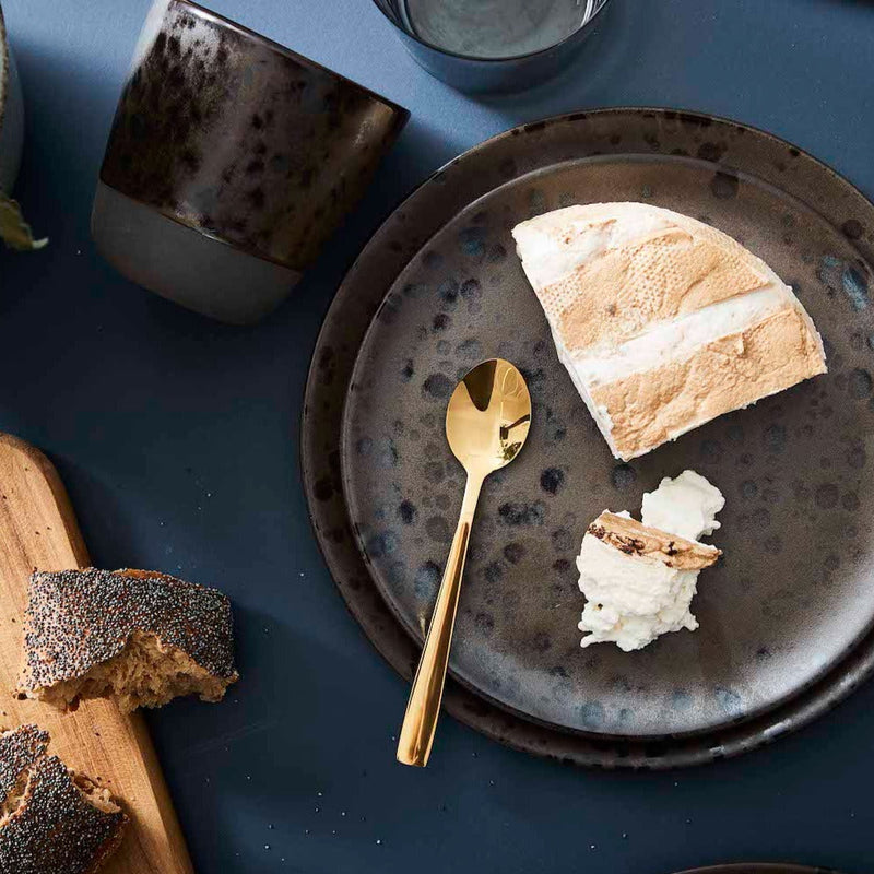 nordic brown ceramic mug by aida styled on a breakfast table for calm slow mornings
