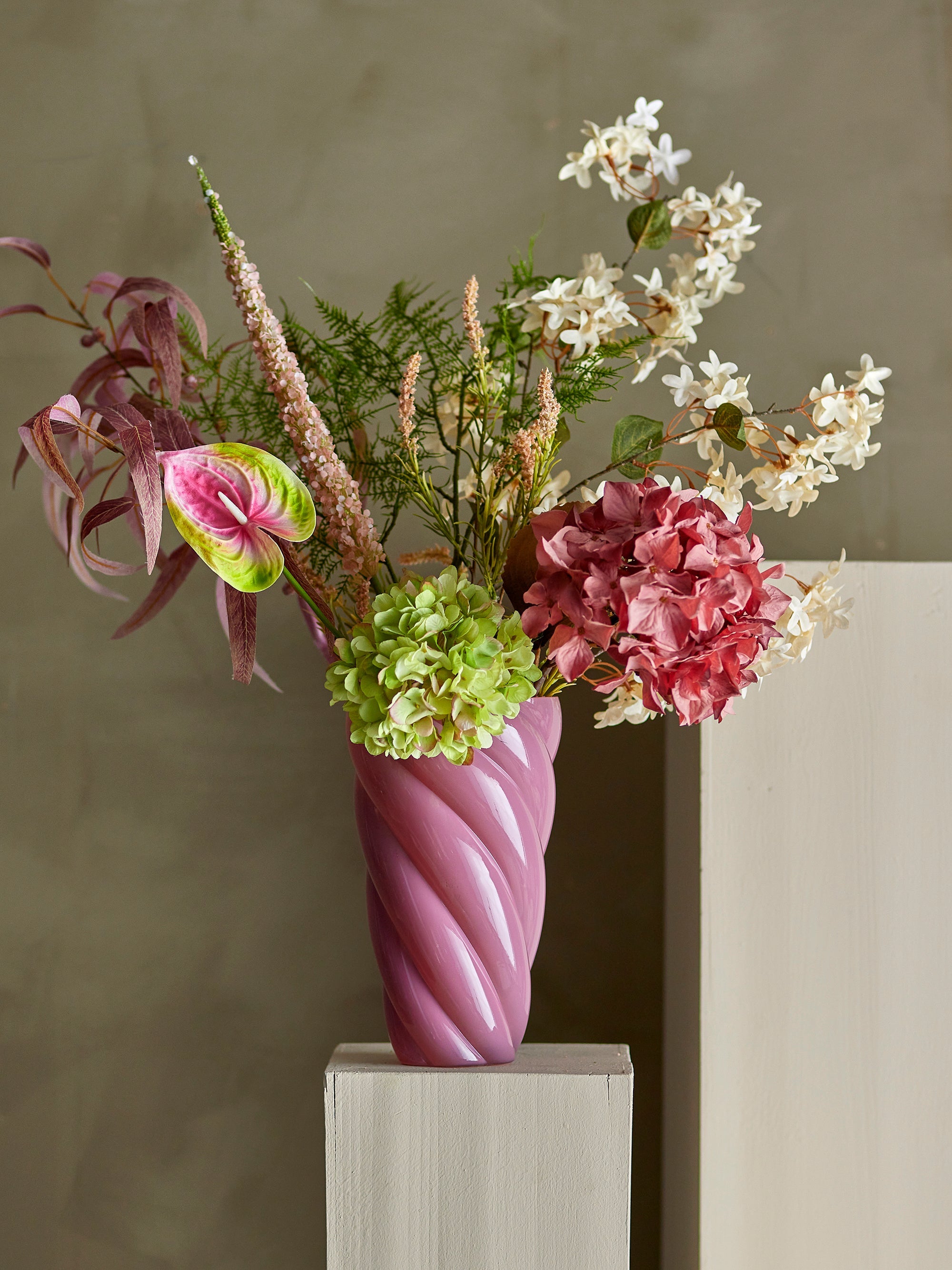 Artificial eucalyptus stem in red by Bloomingville styled in vase