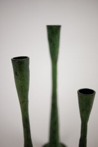 Close-up of the candle cups on the Ashraf green candlesticks by Olsson & Jensen