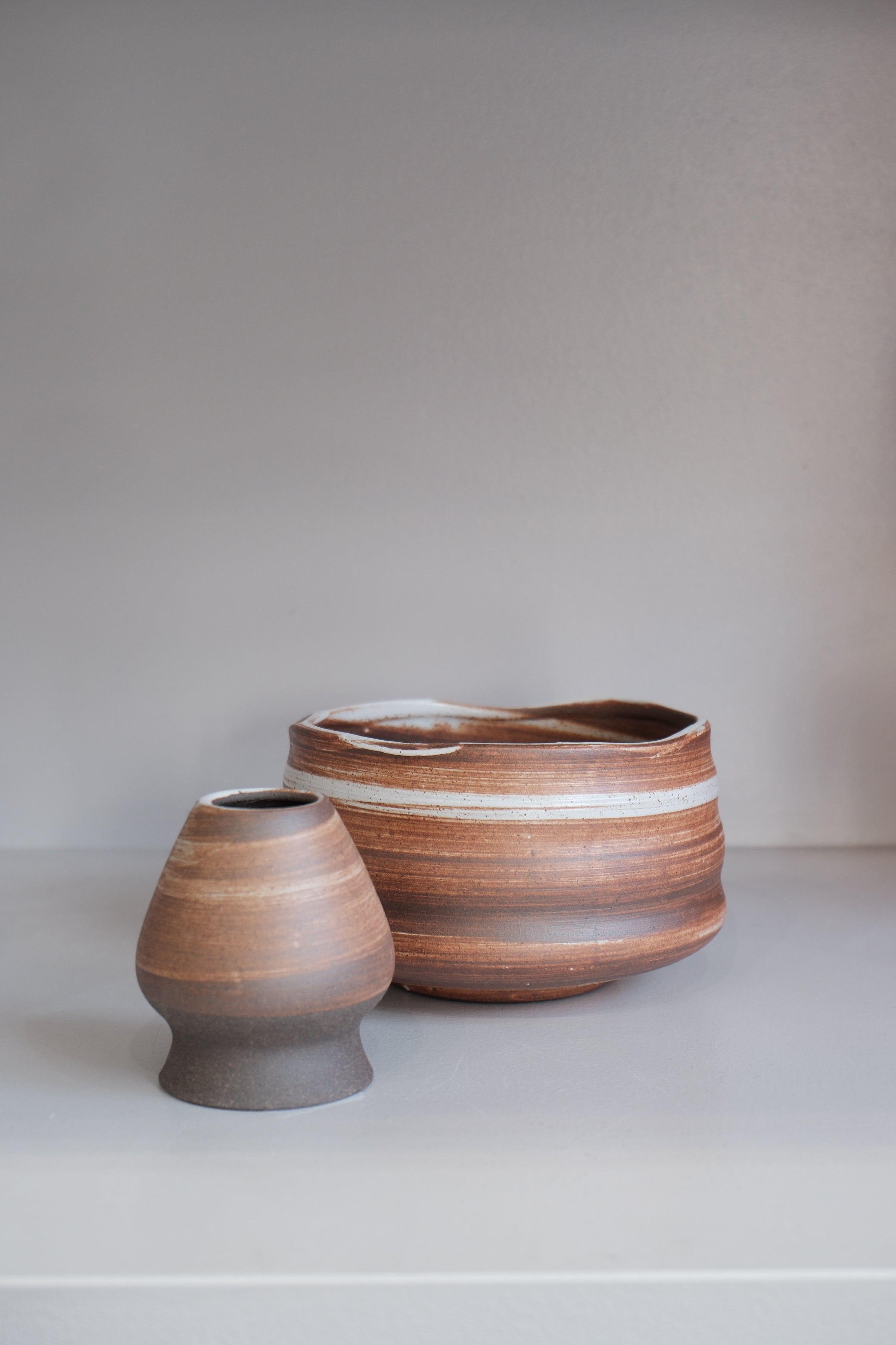 handmade auburn ceramic matcha bowl with finger grooves