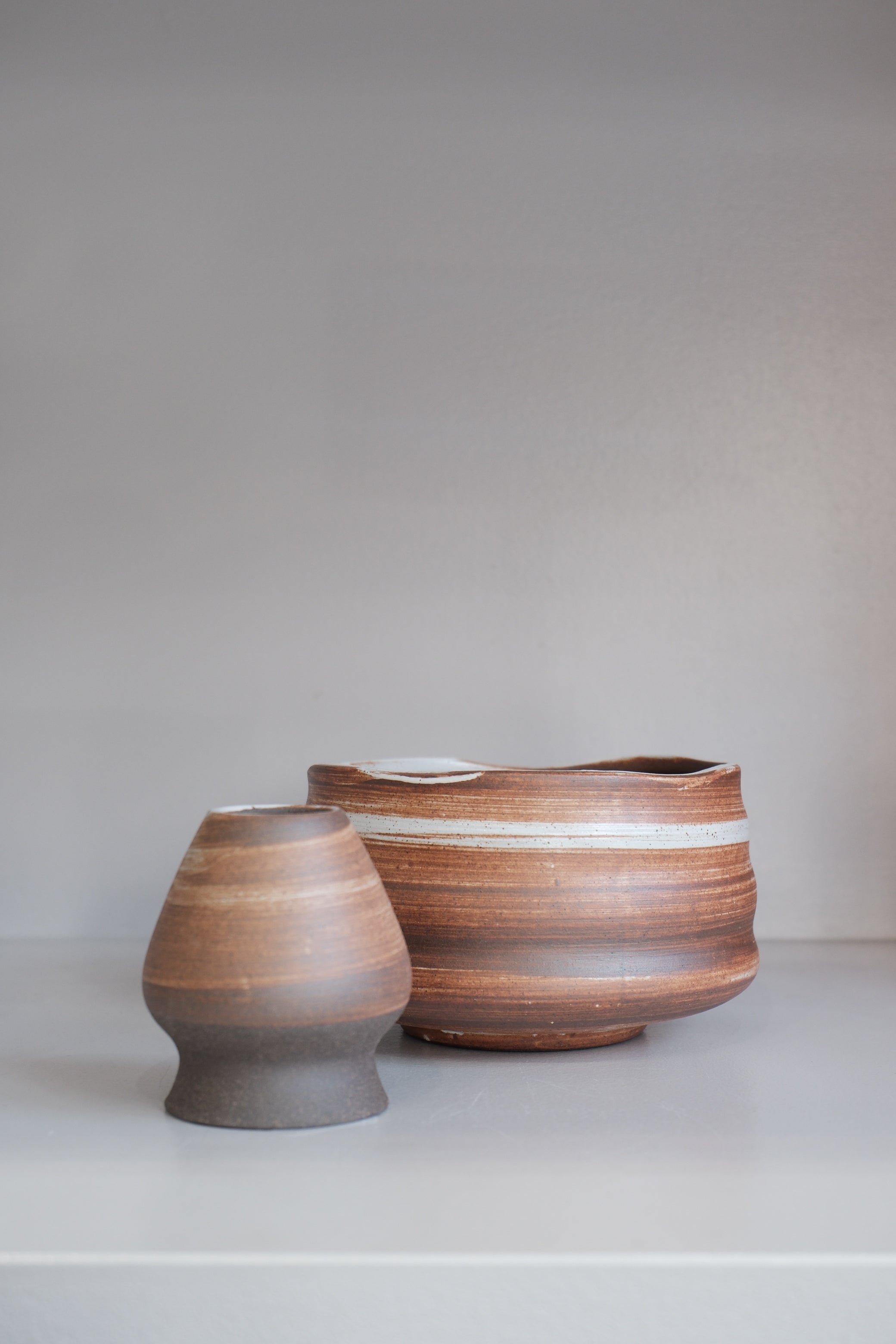 auburn stoneware matcha bowl showing natural glaze variation