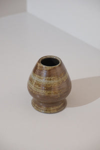 close up of bark ceramic kusenaoshi matcha whisk holder
