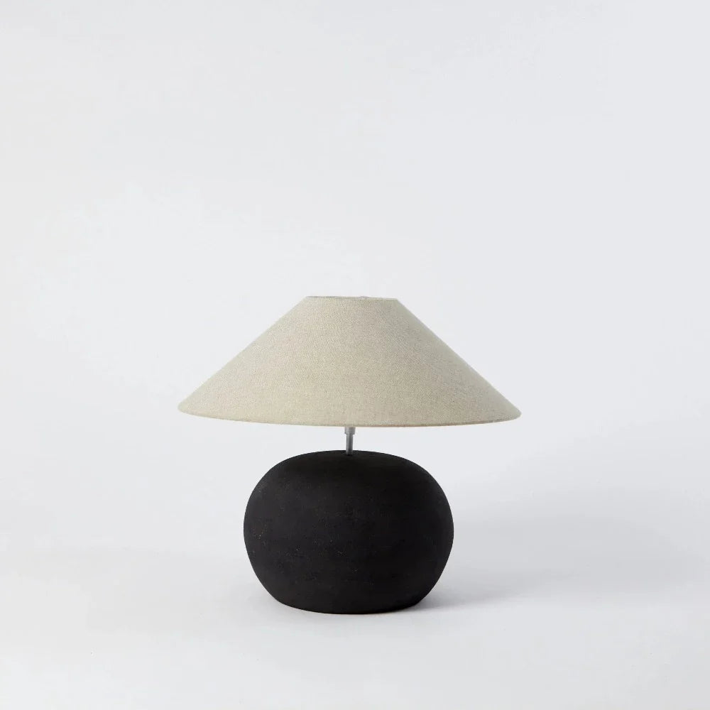 Bellac dark grey lamp base by Olsson & Jensen shown with a cream shade (shade sold separately)
