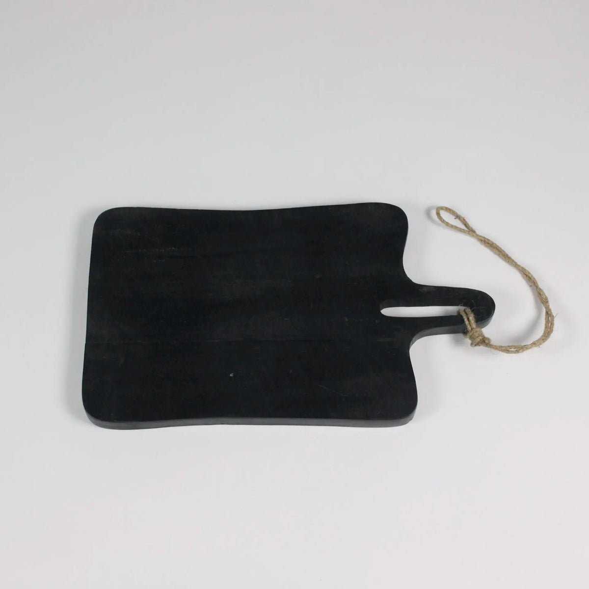 Large black mango wood serving board with handle by Olsson & Jensen