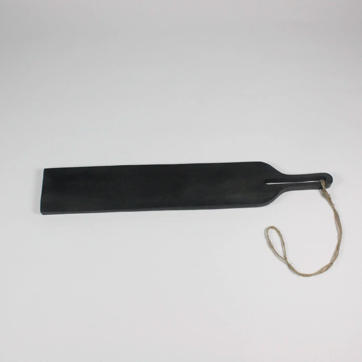 Long black mango wood serving board by Olsson & Jensen