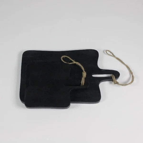 Two black mango wood serving boards by Olsson & Jensen overlapping