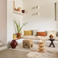 Living room styled with Urban Nature Culture vases and a sculptural side table