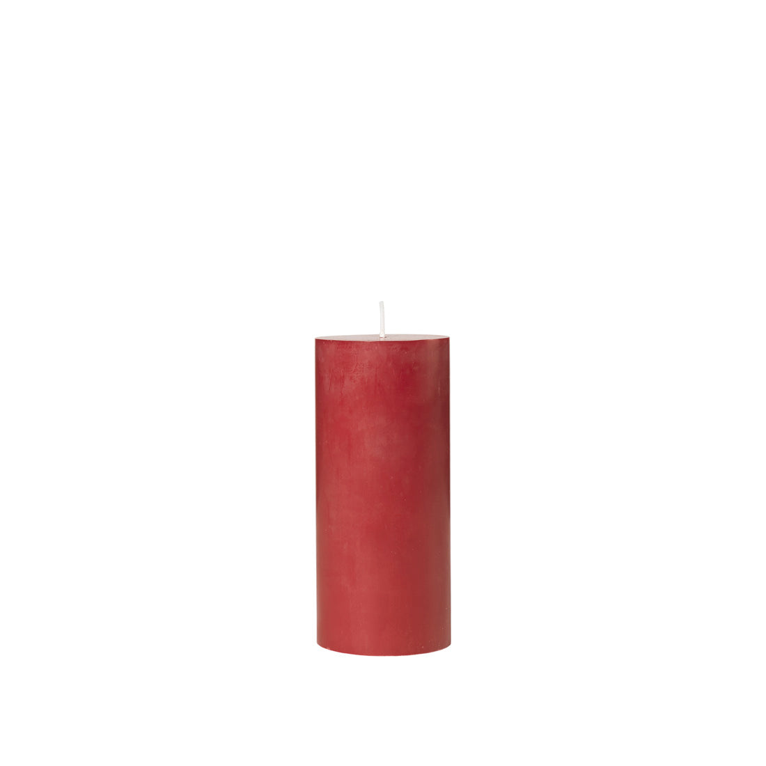 Broste Copenhagen Eco Pillar Candle in red, 15cm, on a white background