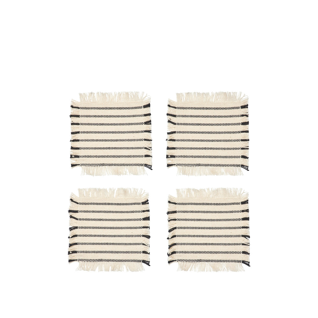 Four Broste Copenhagen Elouise cotton coasters in off white with black stripes and fringed edges