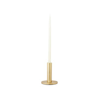 Small brass Maro candle holder holding a white taper candle
