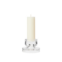 Side view of the Petra glass candle holder holding a cream pillar candle