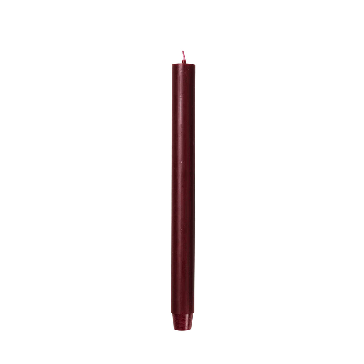 Burgundy Rustic Taper Candle standing upright, showing its mottled rustic surface