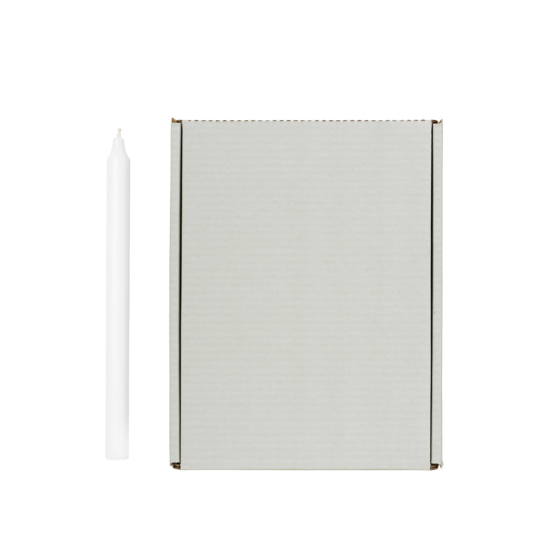White Rustic Taper Candle shown beside its Broste Copenhagen grey box