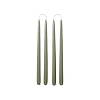 Four Broste Copenhagen Smooth Glossy Taper Candles in Sage Green on a white background