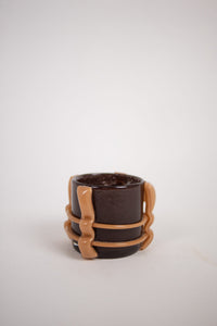 Caramel dark brown glass votive with caramel wrapped bands by Olsson & Jensen