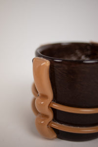 Close-up of the caramel glass bands on the Caramel brown votive by Olsson & Jensen
