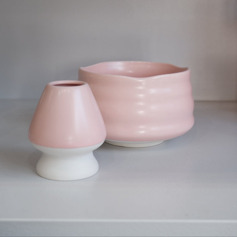 pastel pink chasen naoshi ceramic whisk stand with matching matcha bowl
