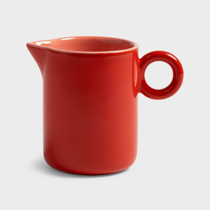 Chiquito milk jug in glossy red porcelain with ring handle by &Klevering